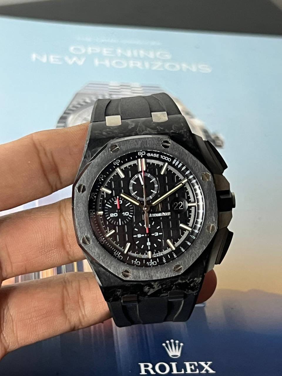 May be an image of wrist watch and text