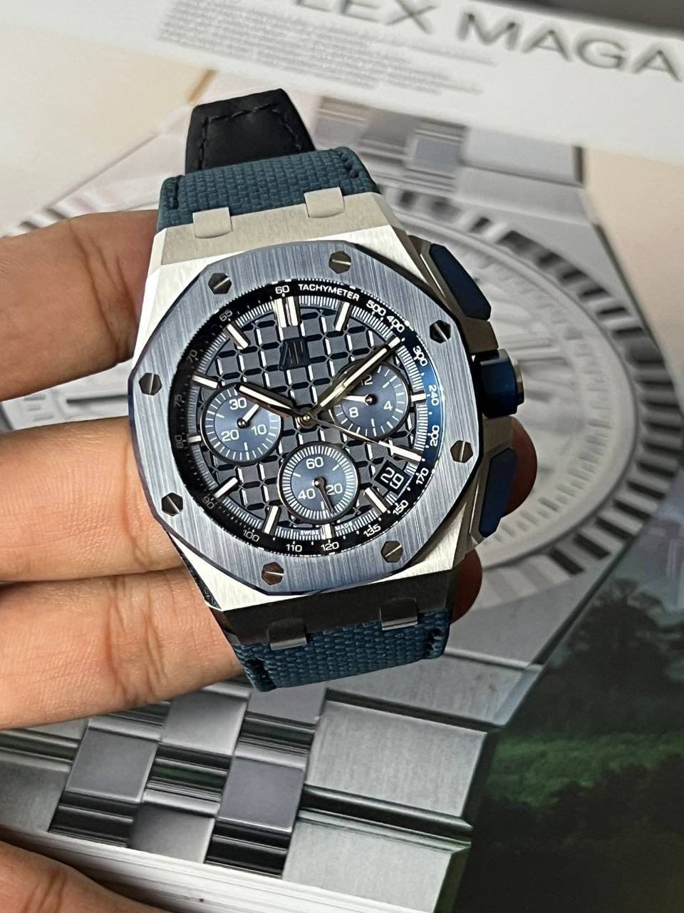 May be an image of wrist watch and text