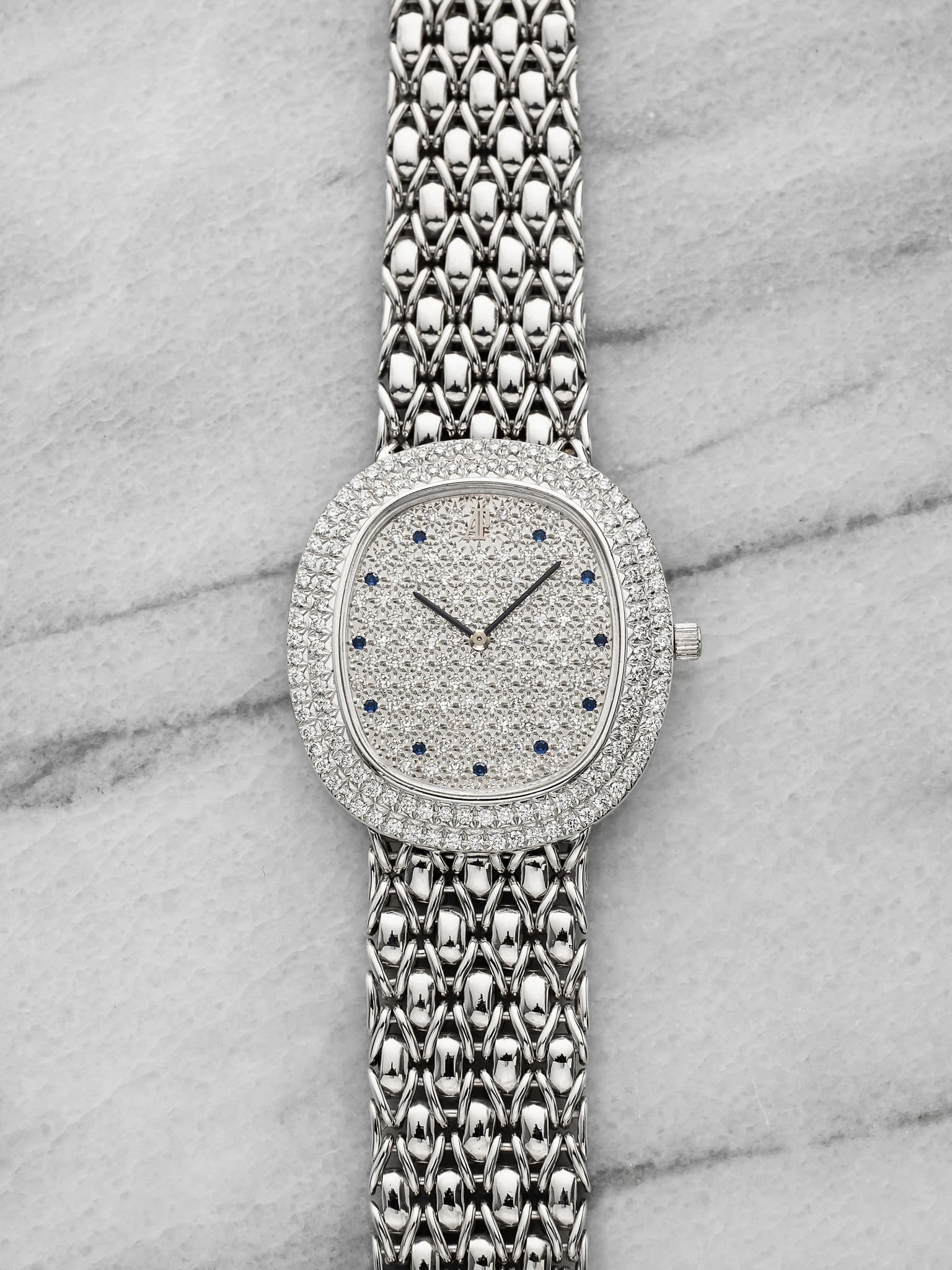 May be an image of jewelry and wrist watch