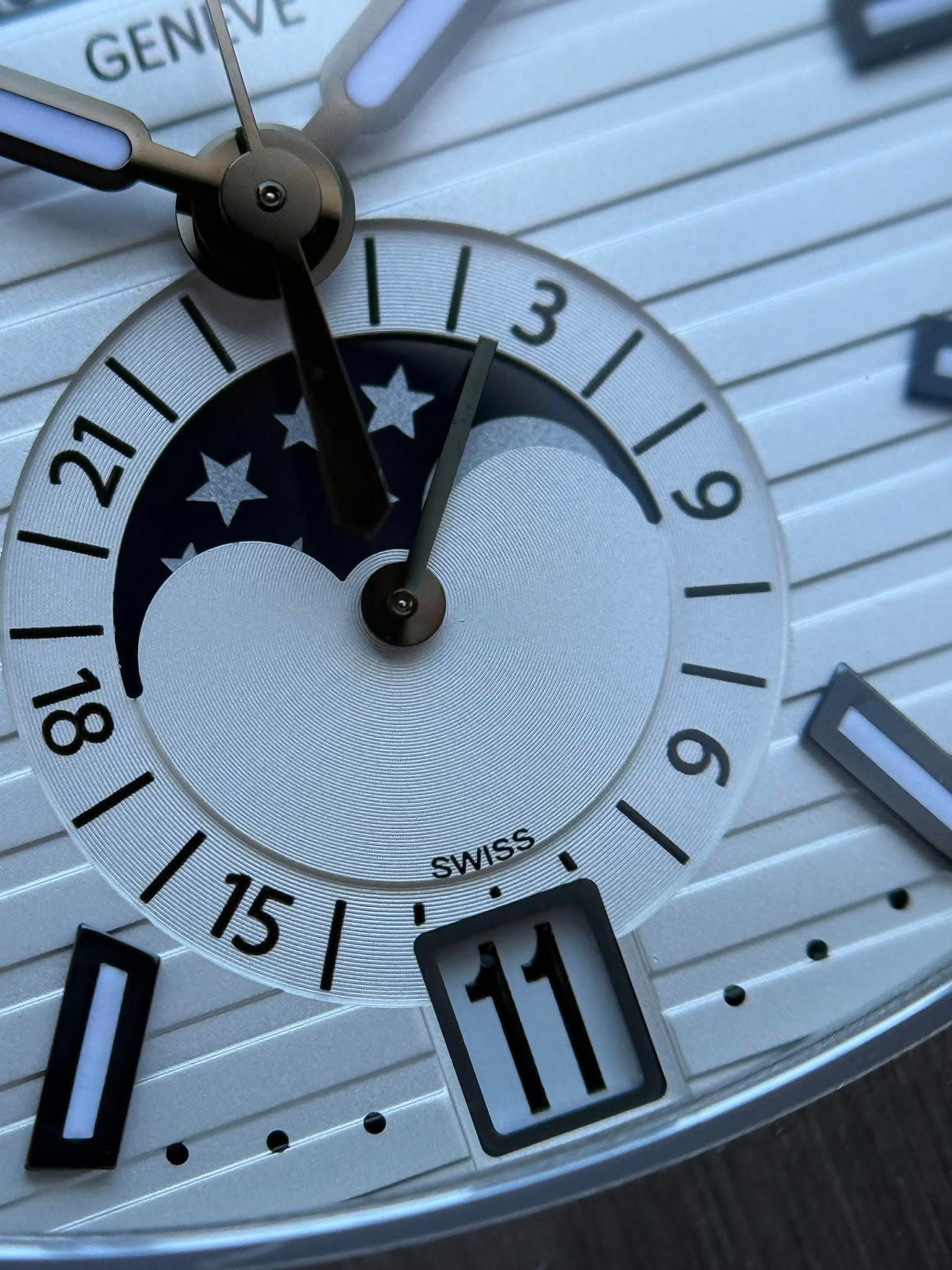 May be an image of wrist watch and text