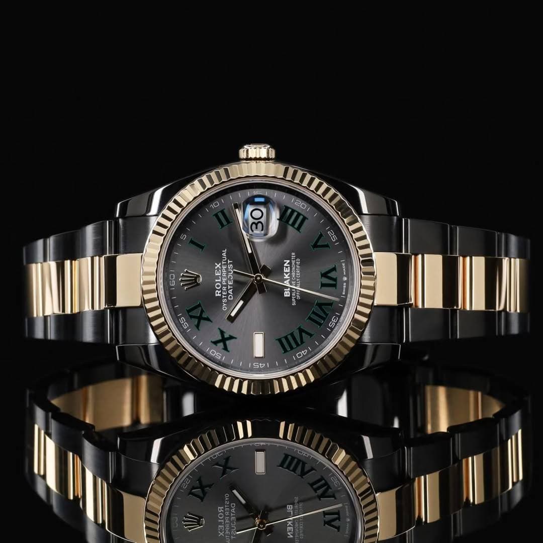 May be an image of wrist watch and text