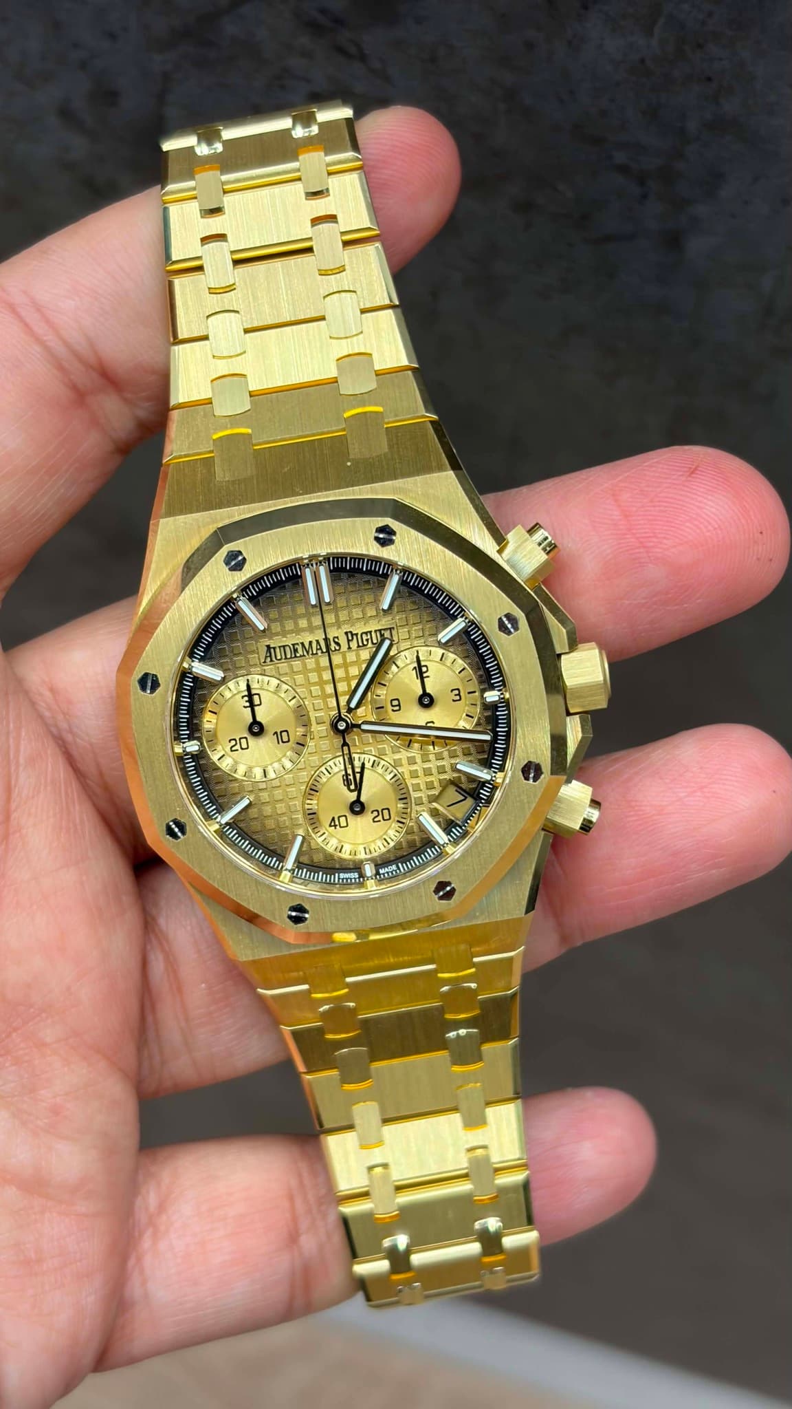 May be an image of wrist watch and text