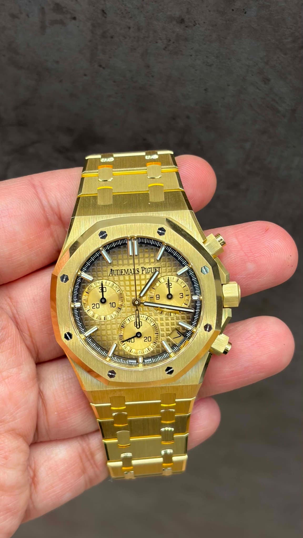 May be an image of wrist watch and text