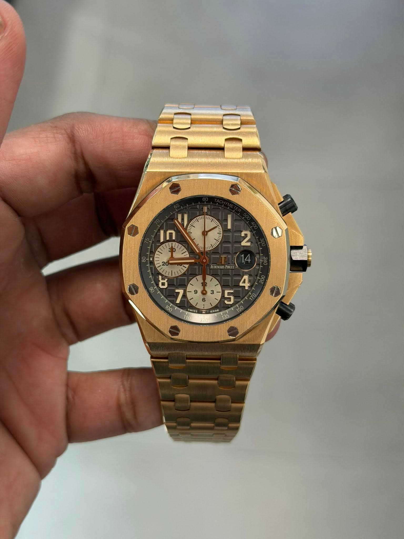 May be an image of wrist watch and text