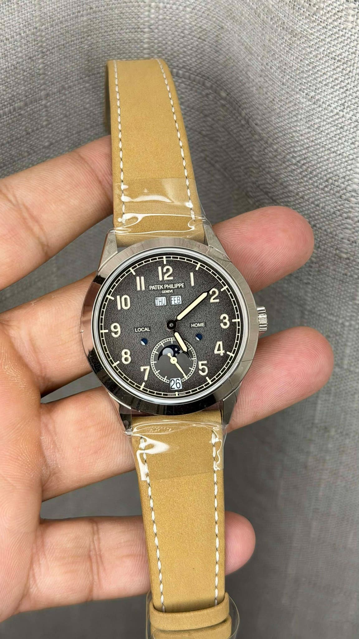 May be an image of wrist watch and text that says '12 PATEK PHLIPPE THO HTB FEB 10 2 9 LOCAL HOME 3 nQUH 8 4 ) C 平 BD y في G ማ 5 26'
