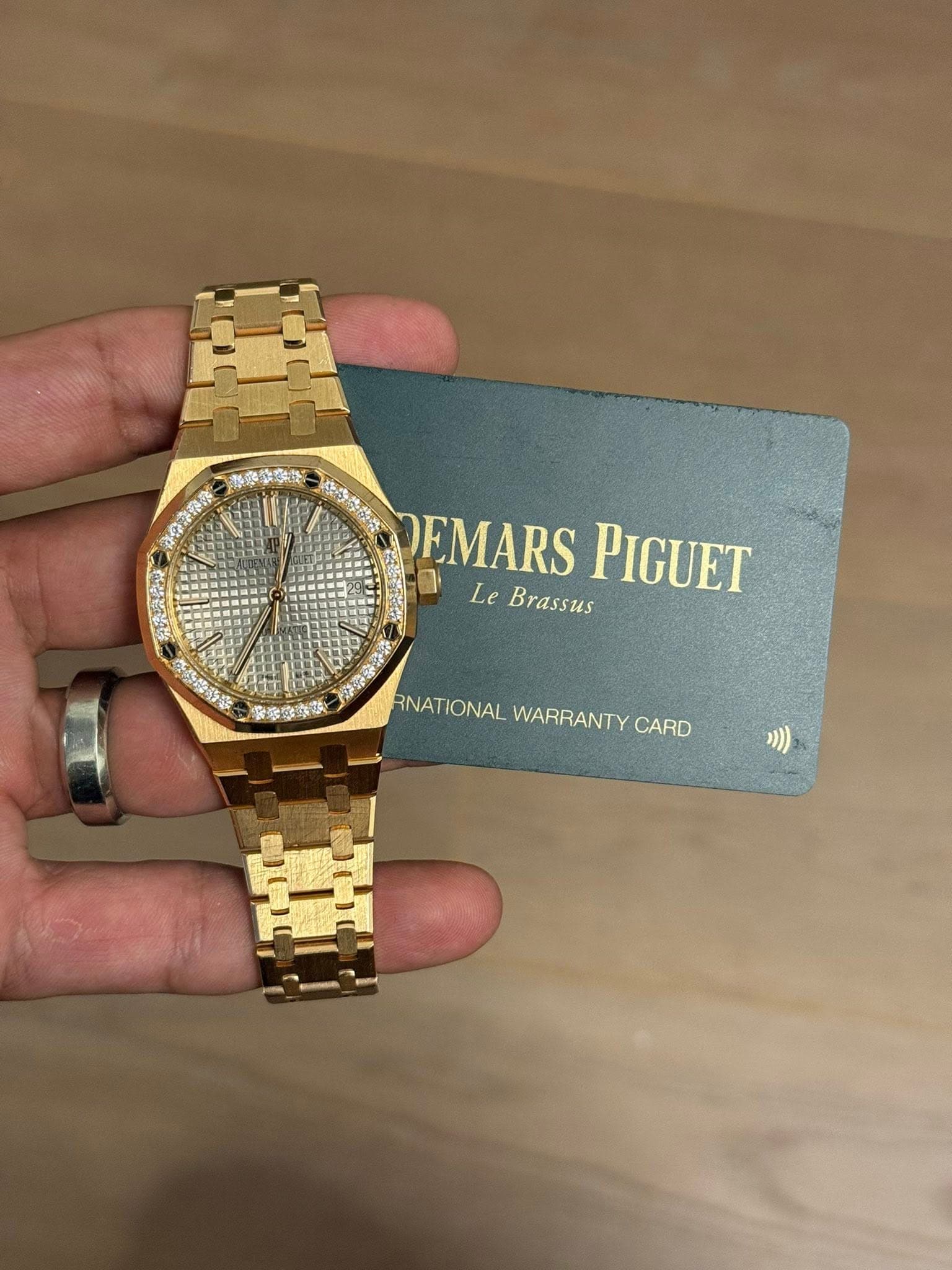 May be an image of wrist watch and text