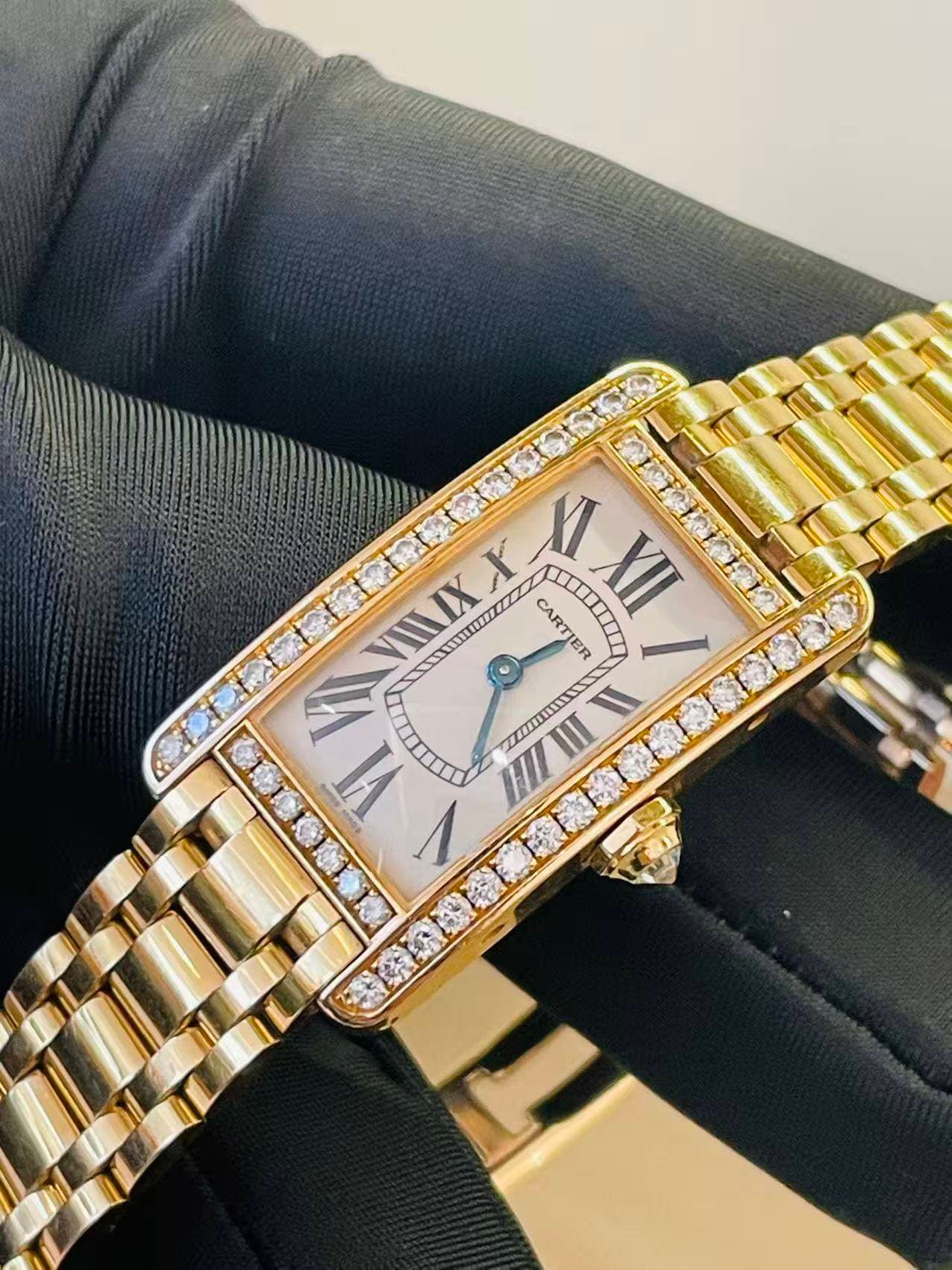 May be an image of wrist watch and text that says 'VINIX 7. X X XI XII CARTIER ER I Π И V HIIII T LOMOIALL I'