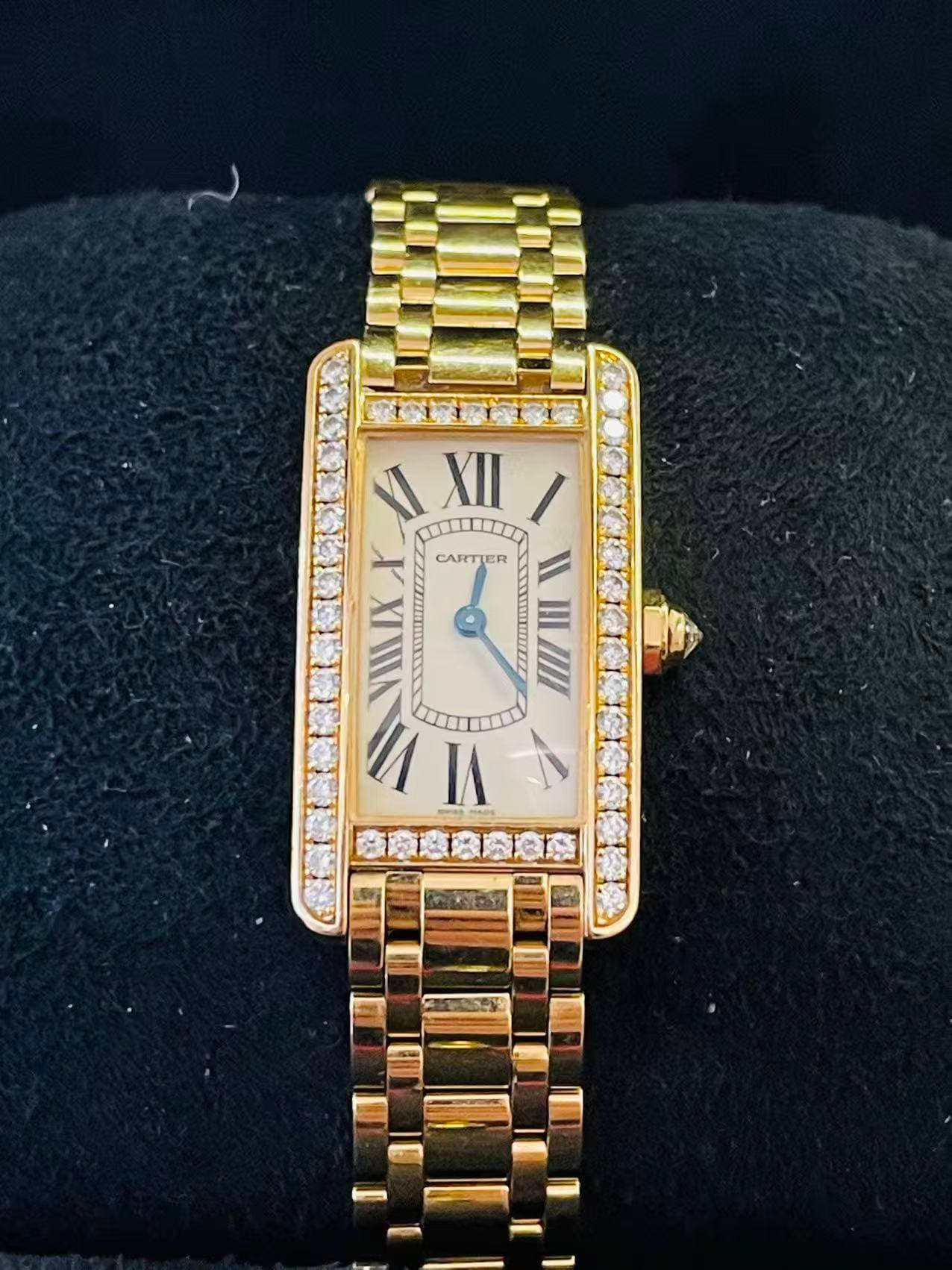 May be an image of wrist watch and text