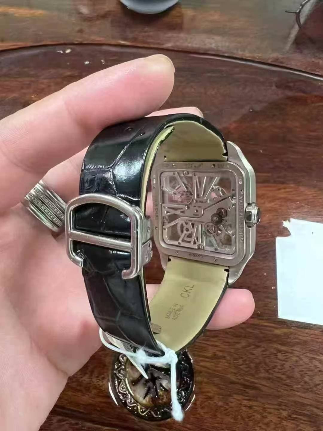May be an image of digital watch and text