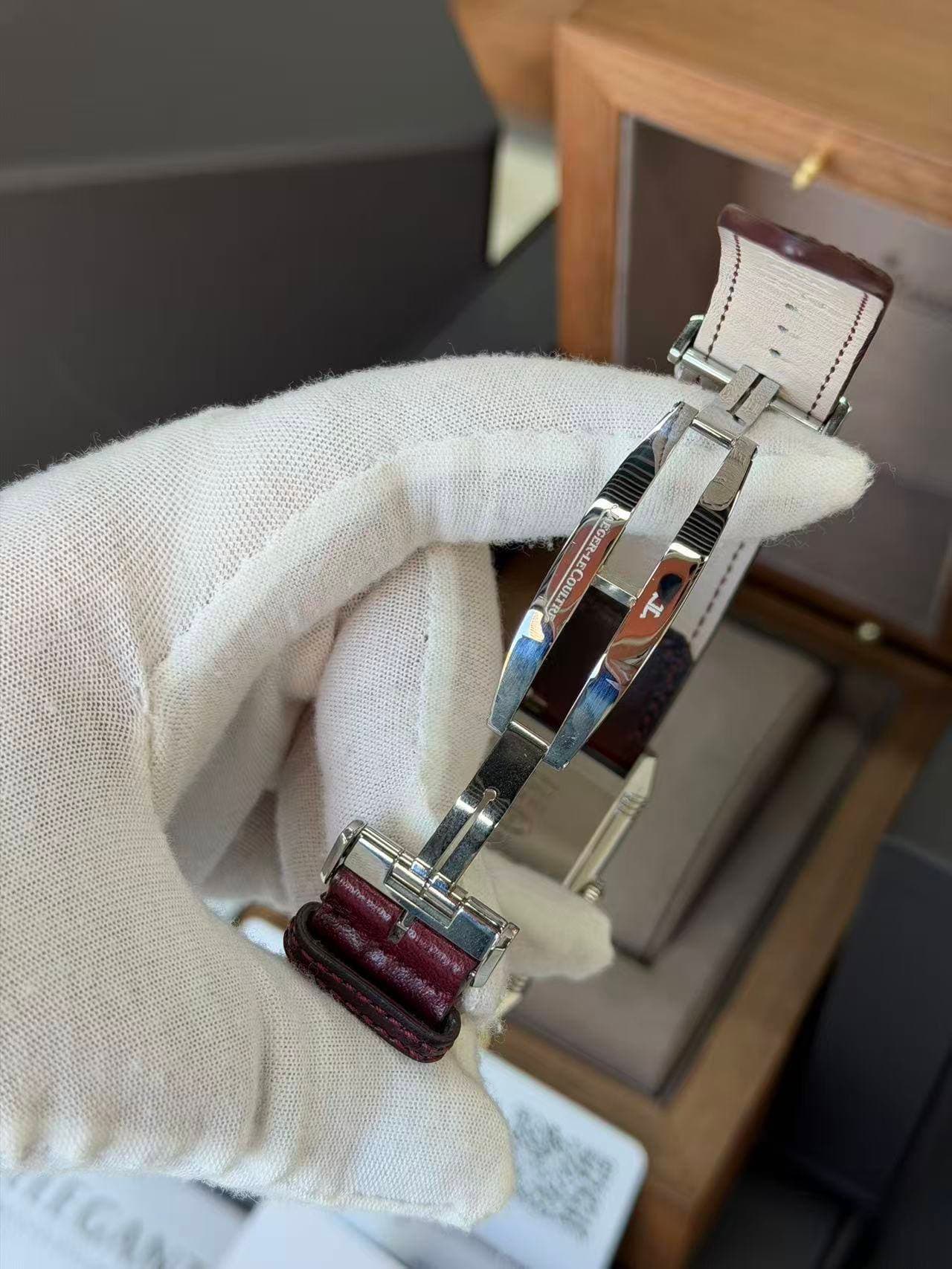 May be an image of jewelry, wrist watch and text