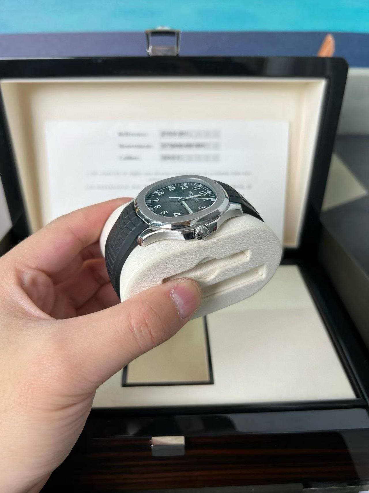 May be an image of wrist watch and text