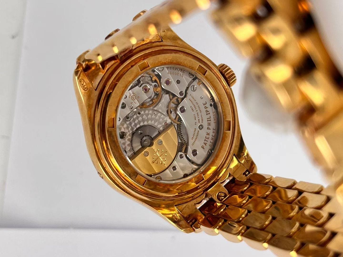 May be an image of wrist watch and text