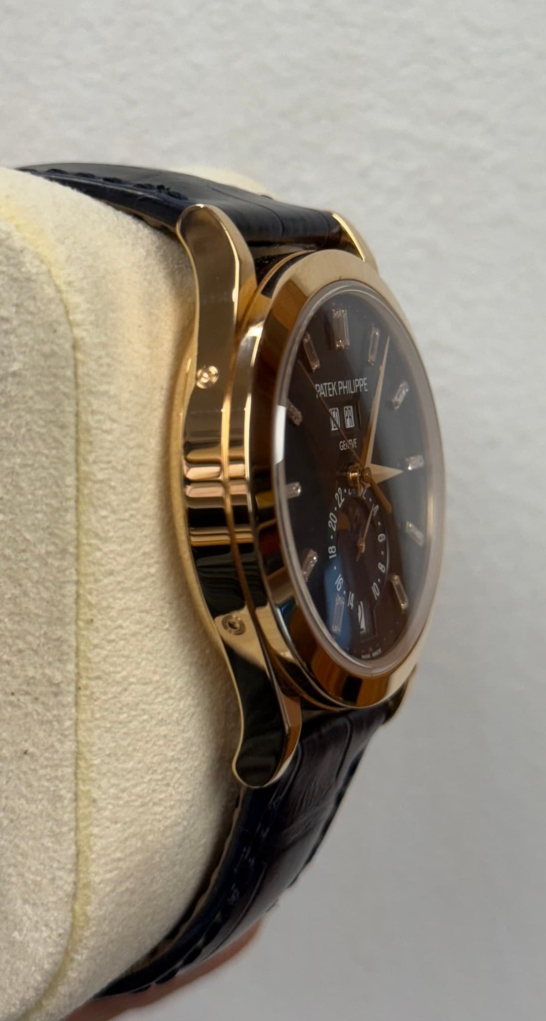May be an image of wrist watch and text