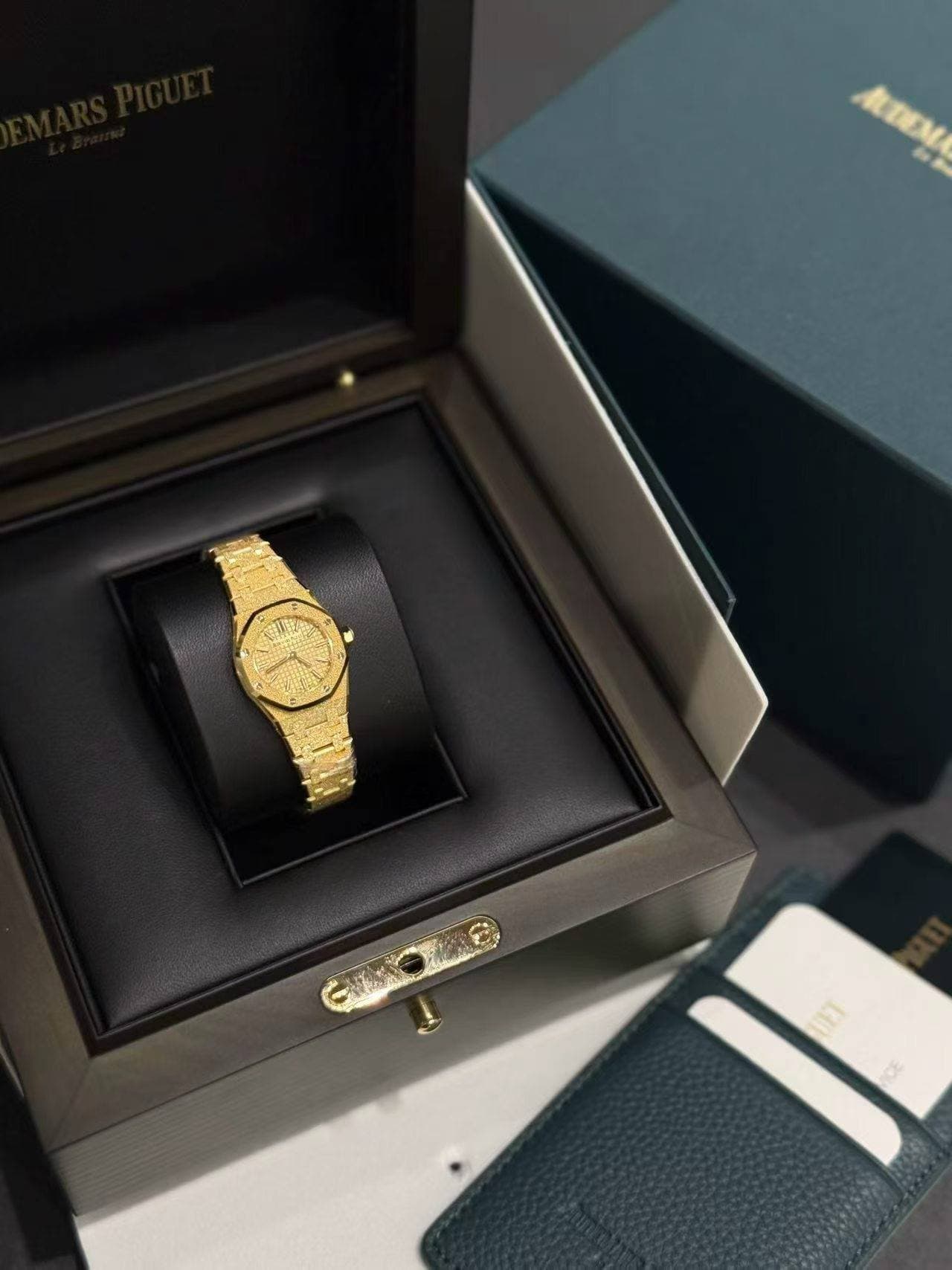 May be an image of wrist watch and text