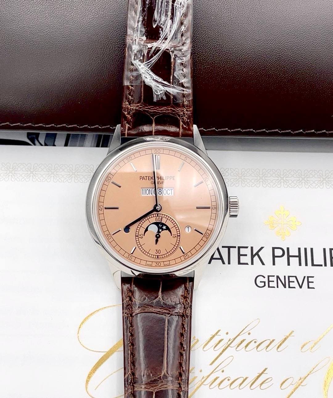 May be an image of wrist watch and text