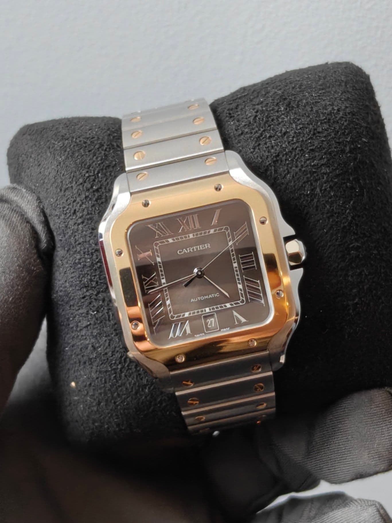 May be an image of wrist watch and text