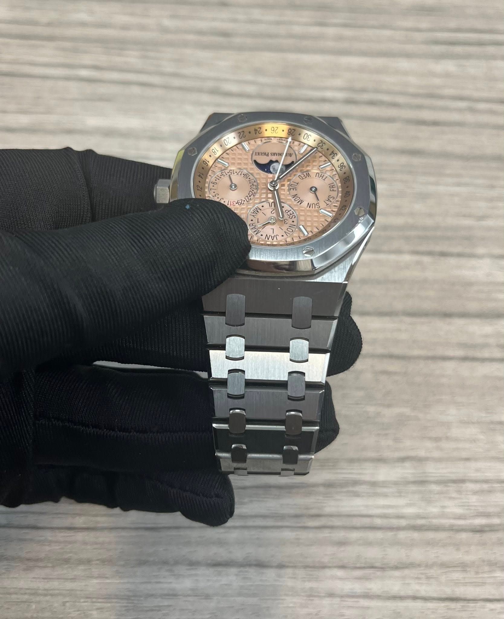 May be an image of wrist watch and text
