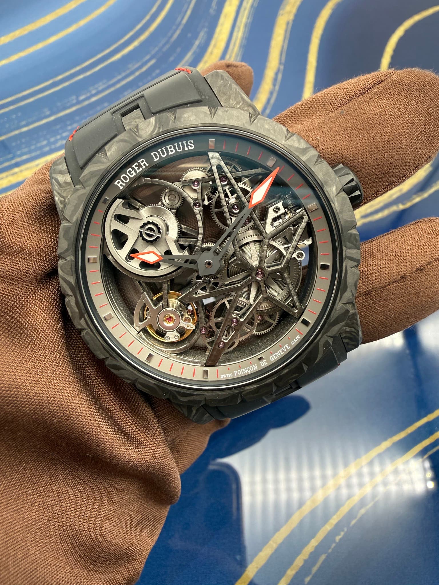 May be an image of wrist watch and text