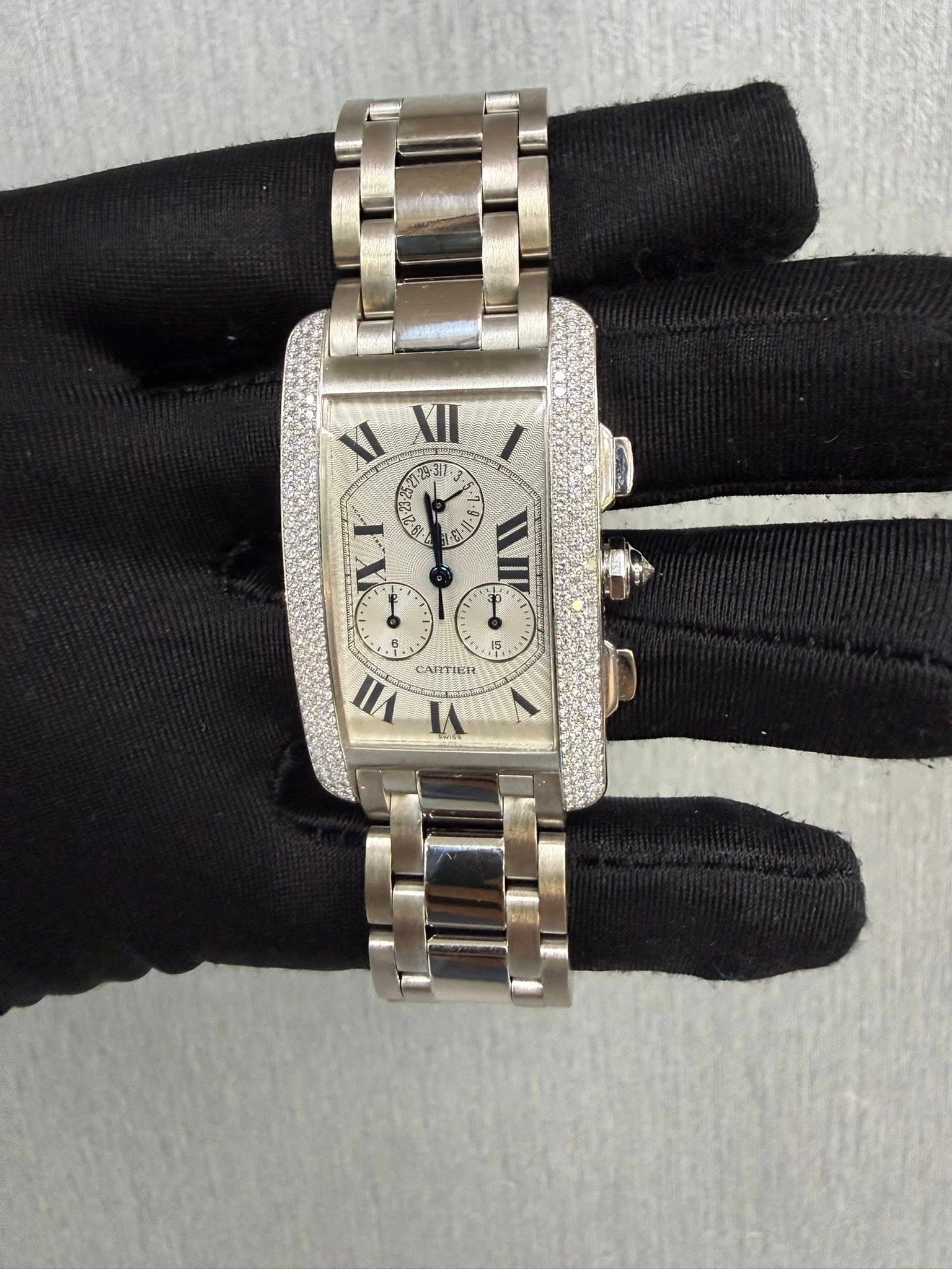 May be an image of wrist watch and text that says 'XII 1-23311 ح L P 15 15 B VII VI ANTIER'