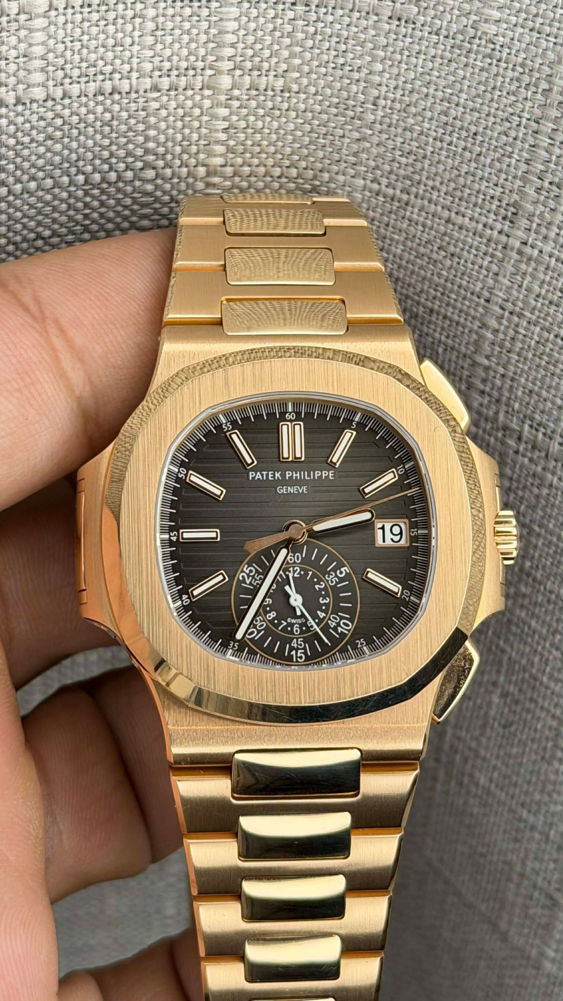 May be an image of wrist watch and text