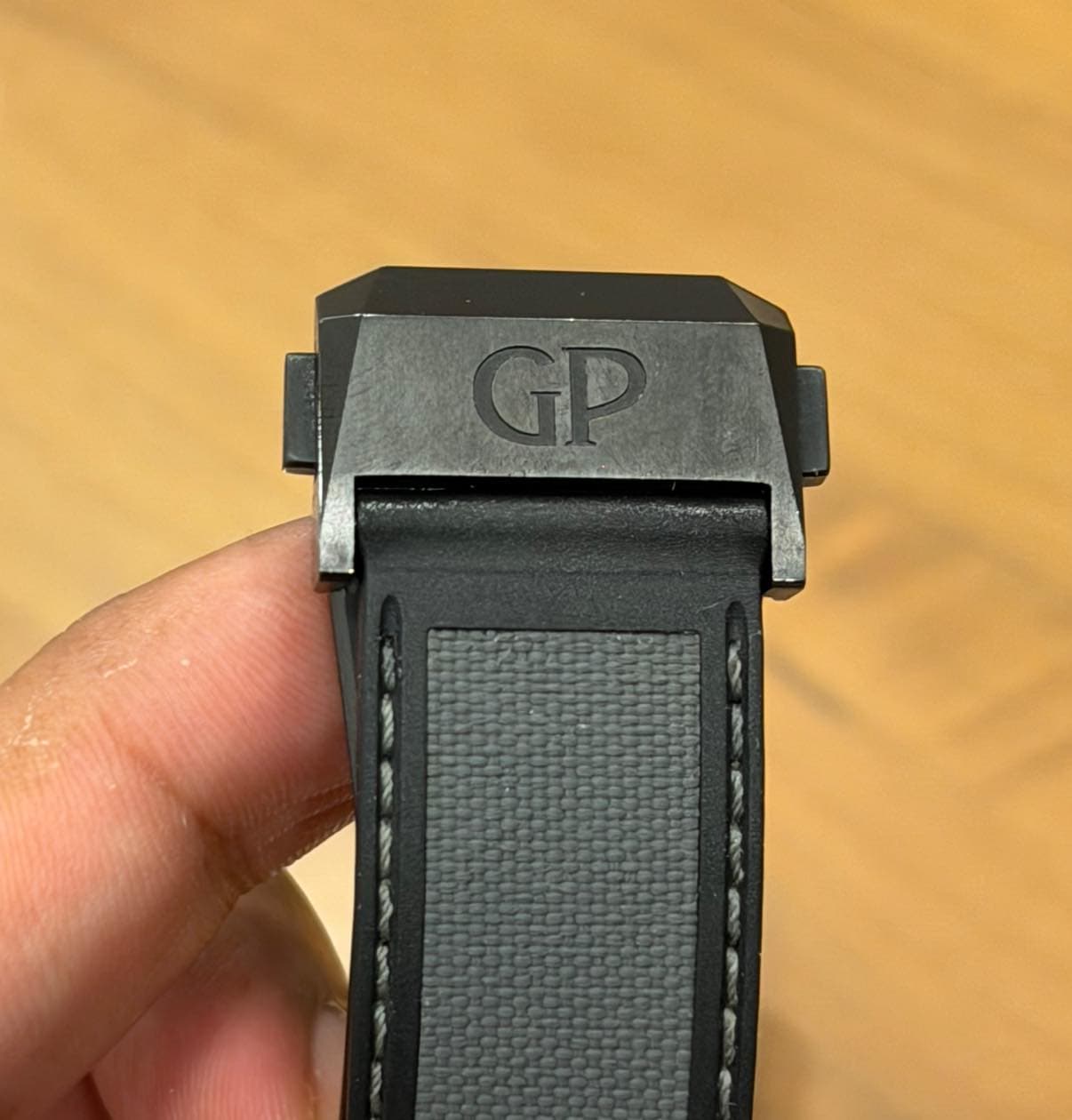May be an image of digital watch and text that says 'GP'