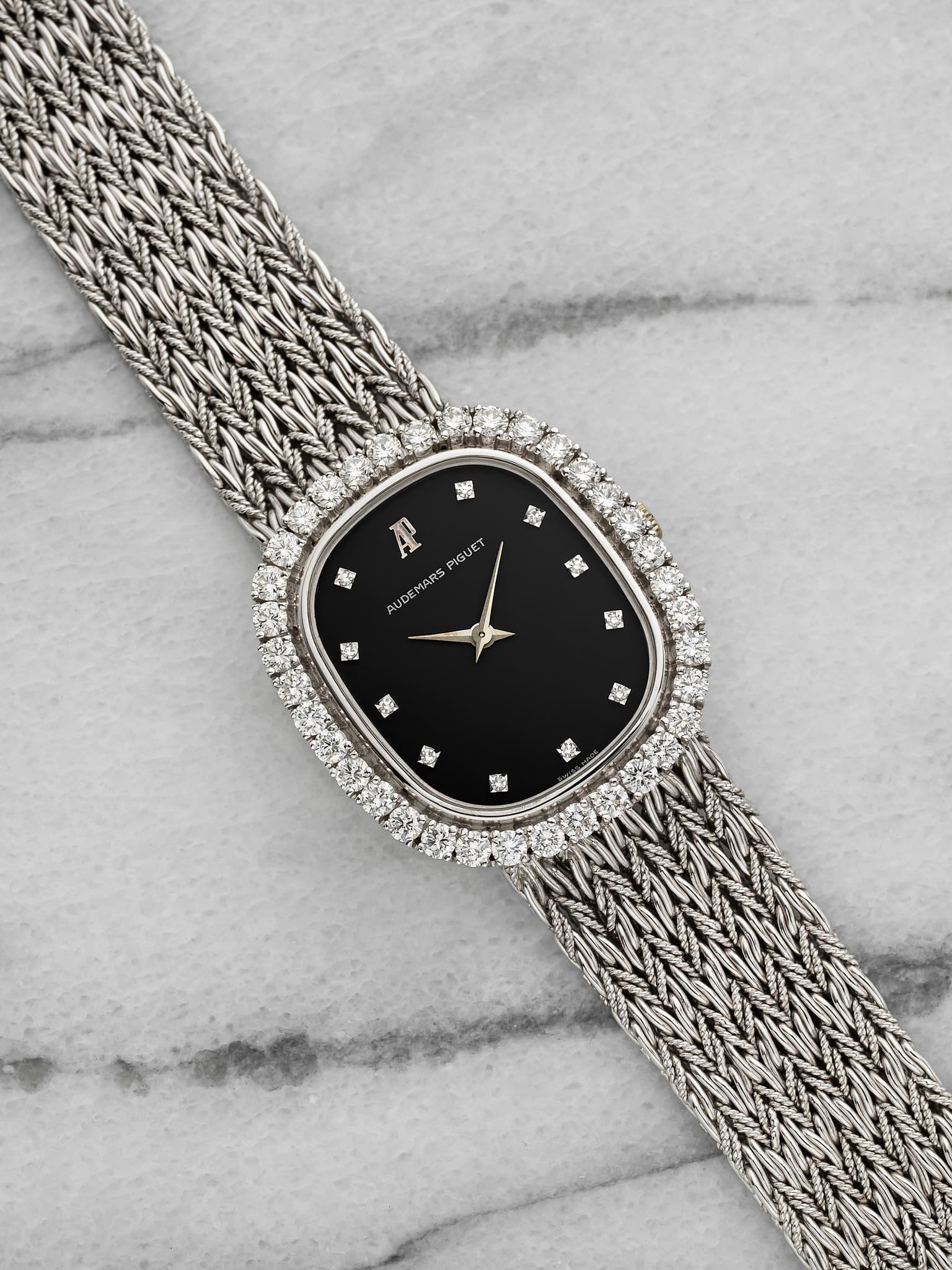 May be an image of wrist watch