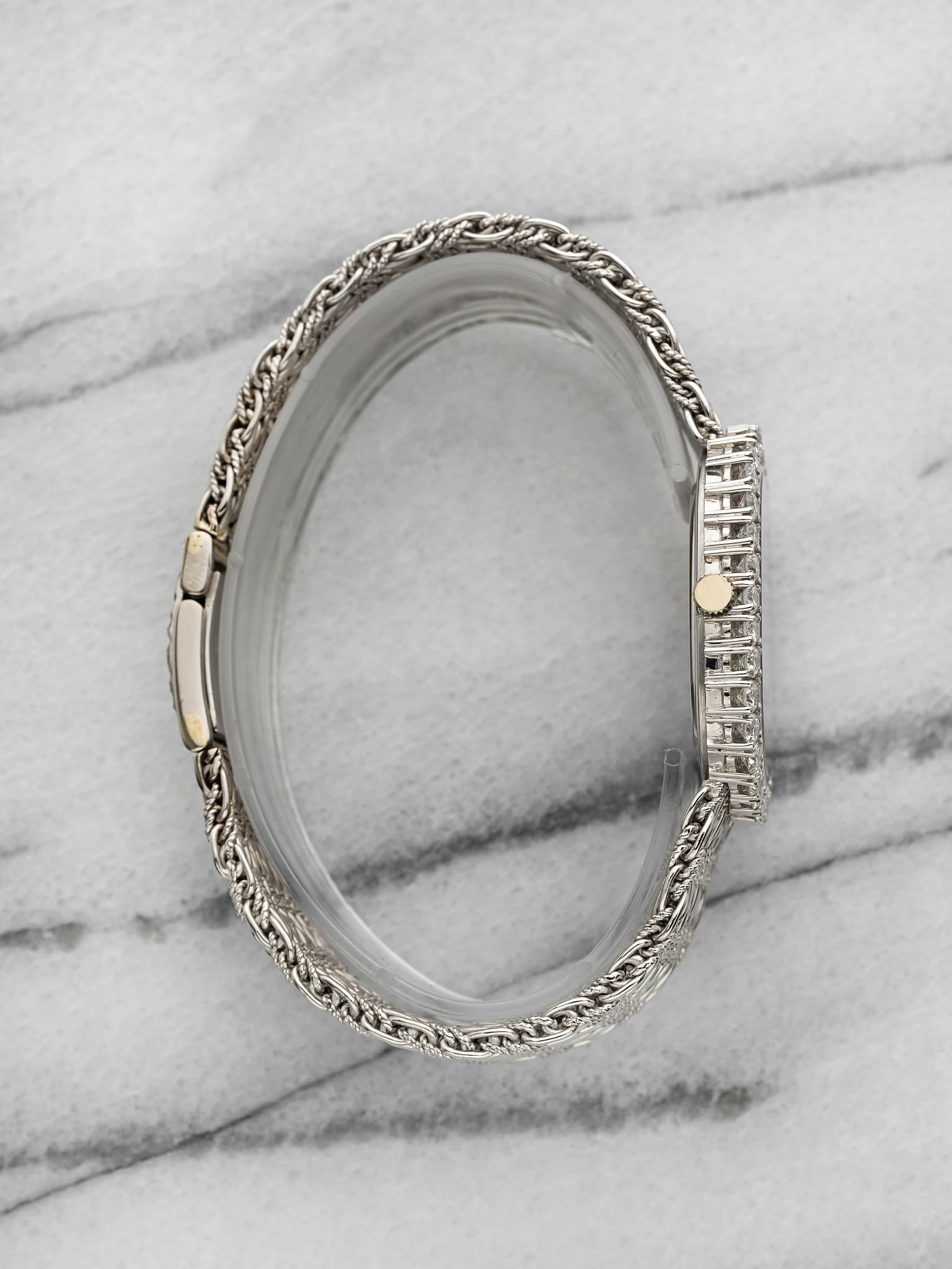 May be an image of jewelry and wrist watch