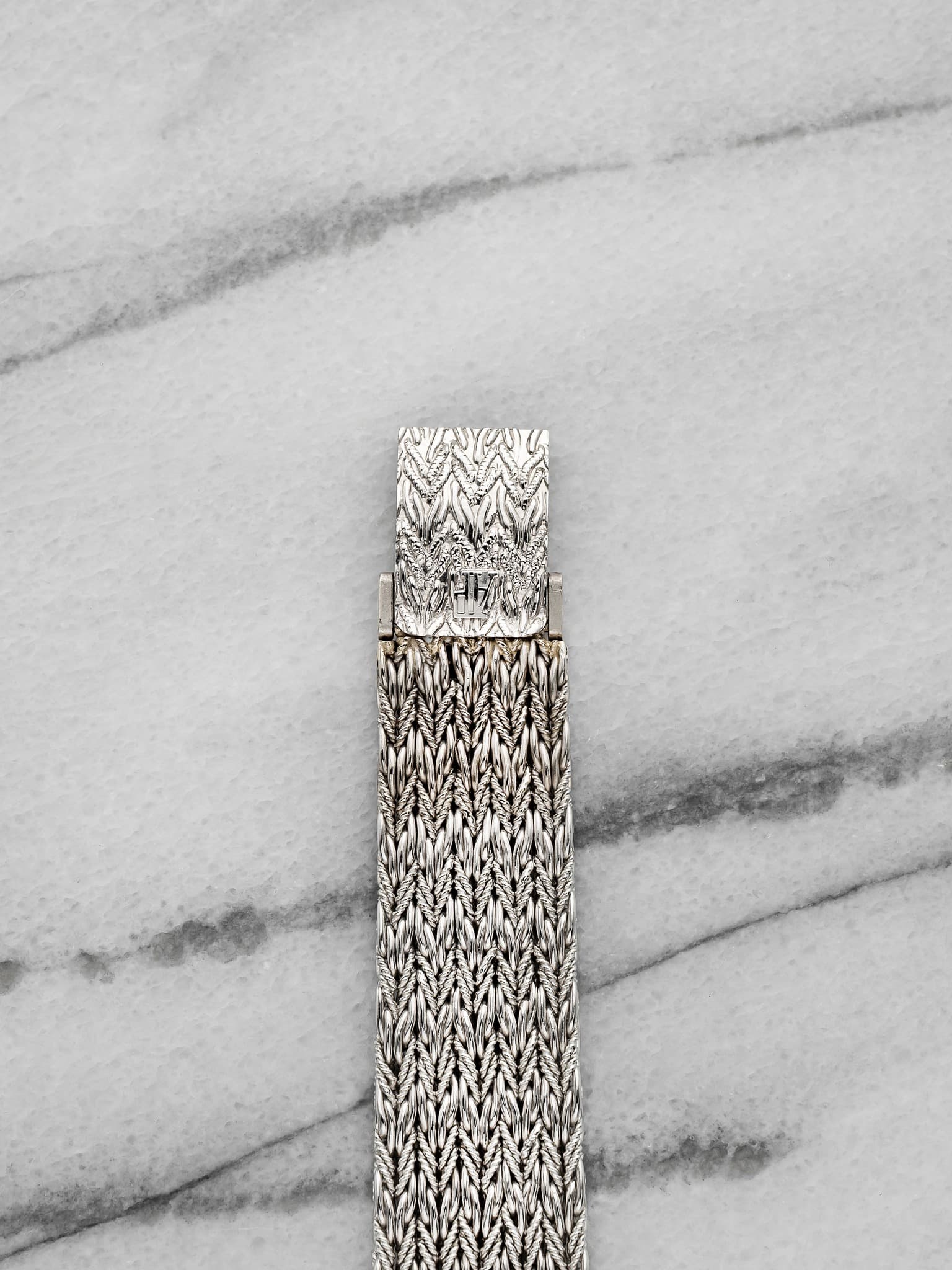 May be an image of jewelry and brass