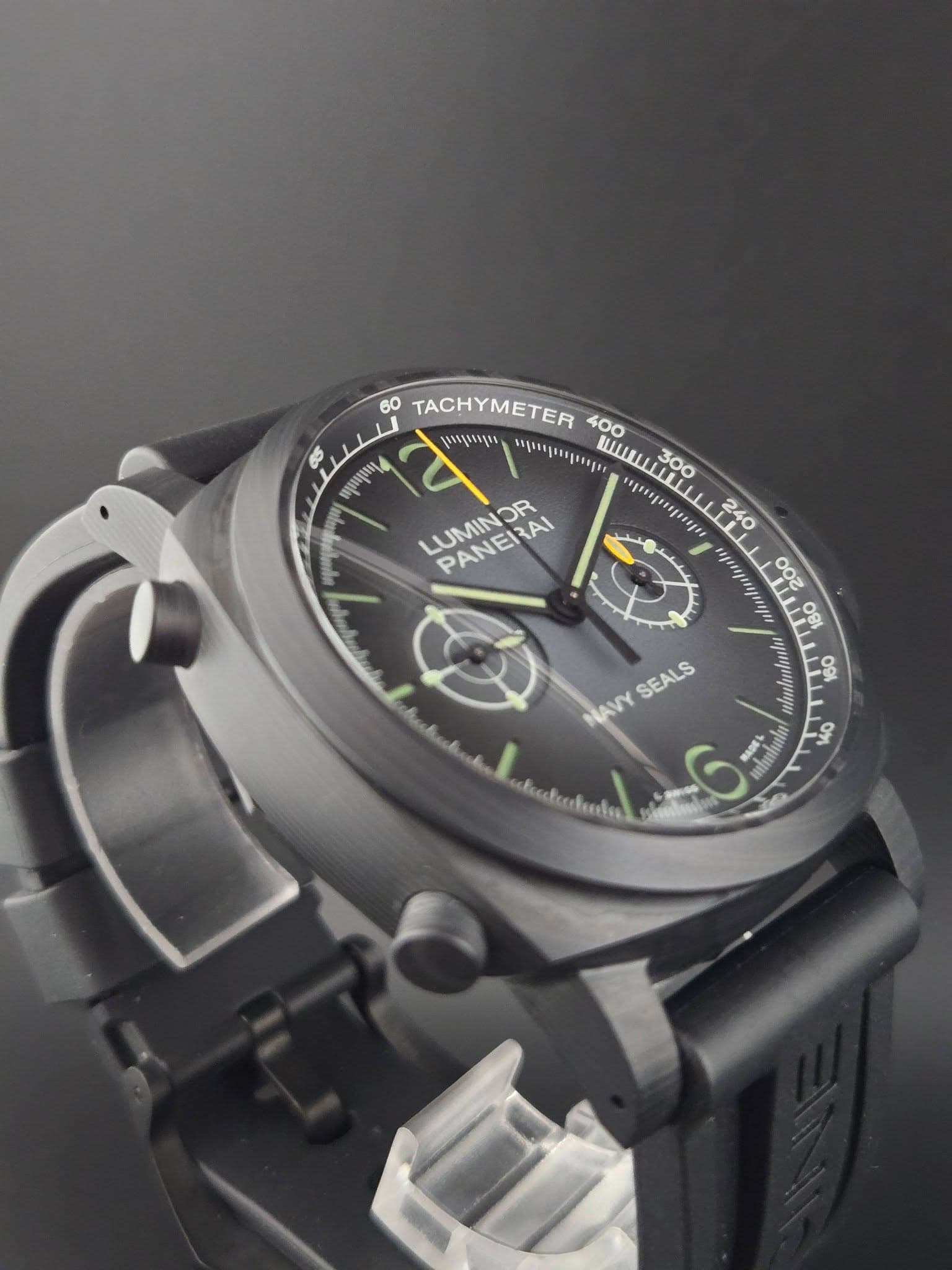 May be an image of wrist watch and text