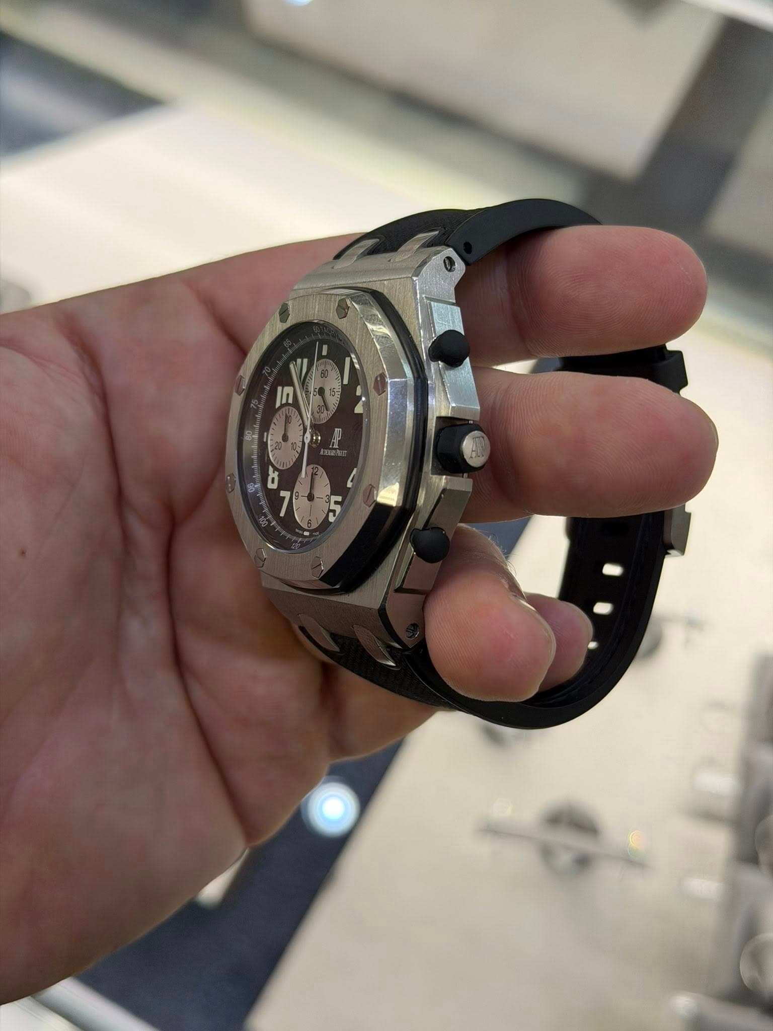 May be an image of wrist watch and text
