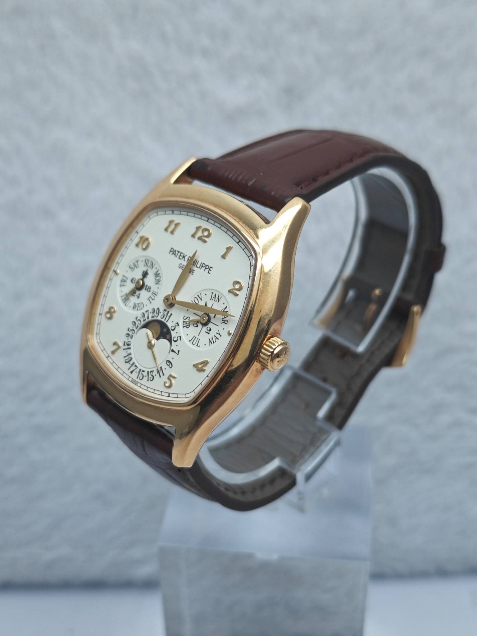 May be an image of wrist watch and text