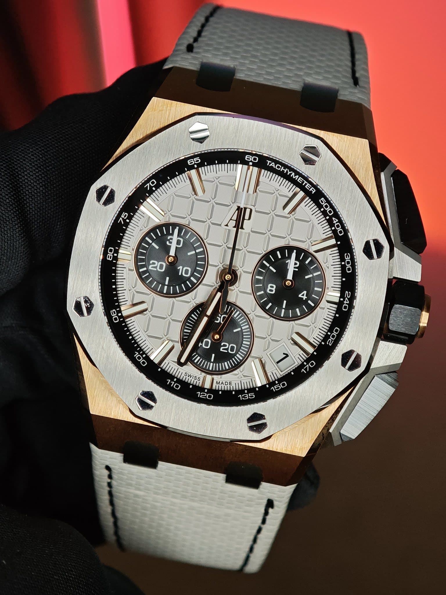 May be an image of wrist watch and text