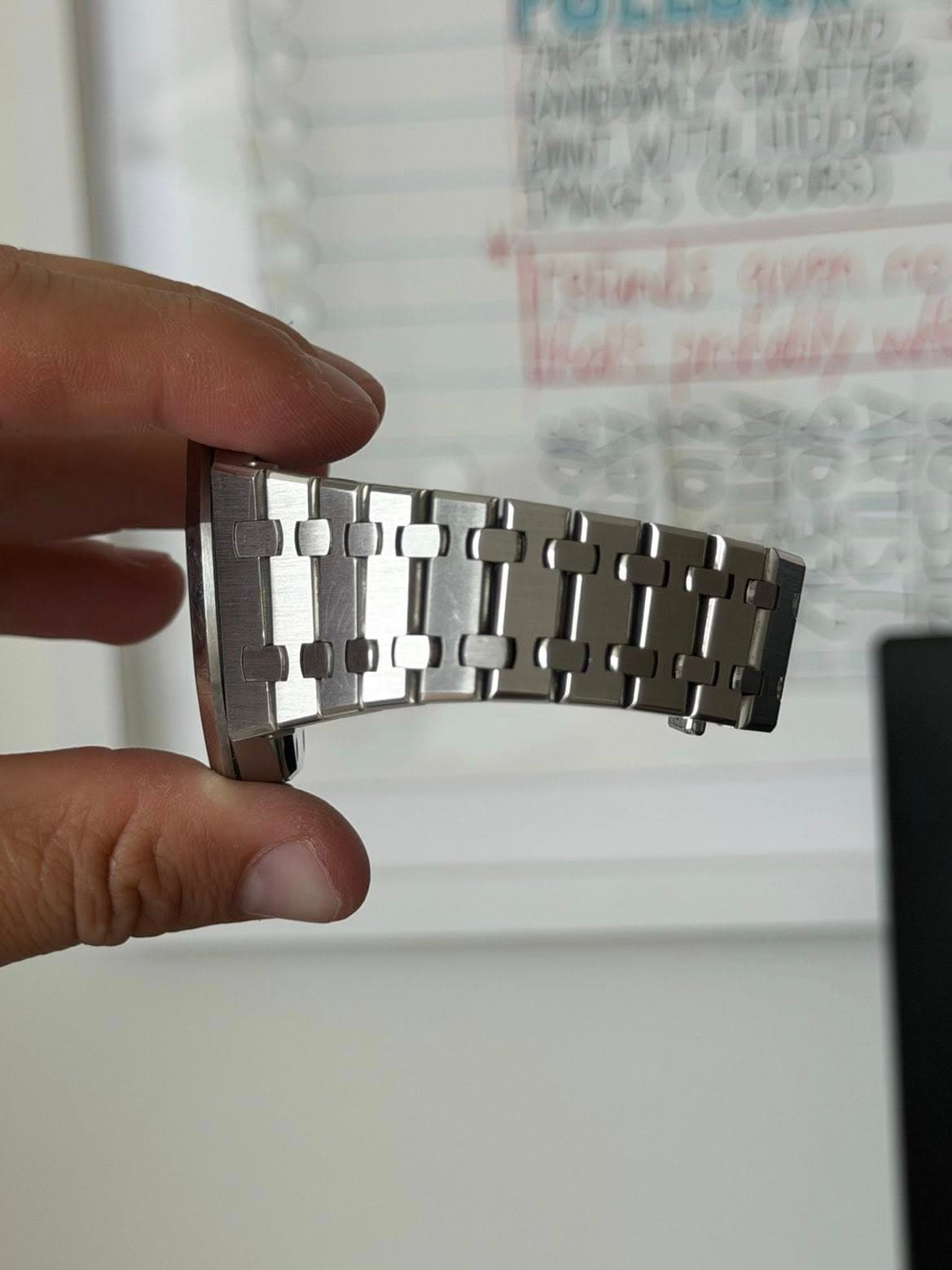 May be an image of digital watch and text