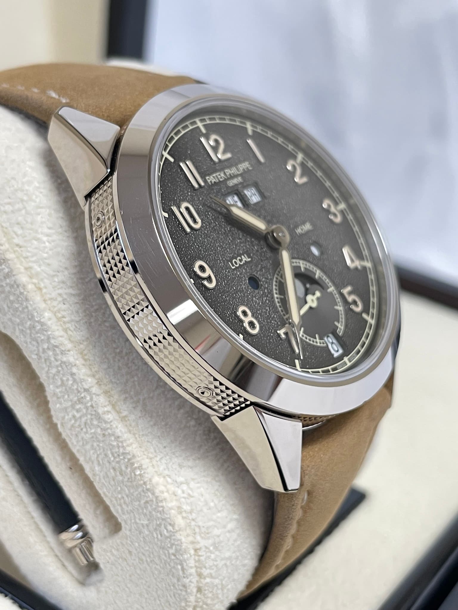 May be an image of wrist watch and text
