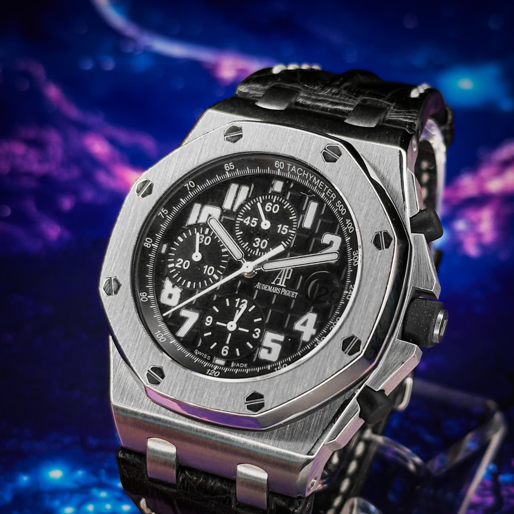 May be an image of wrist watch and text