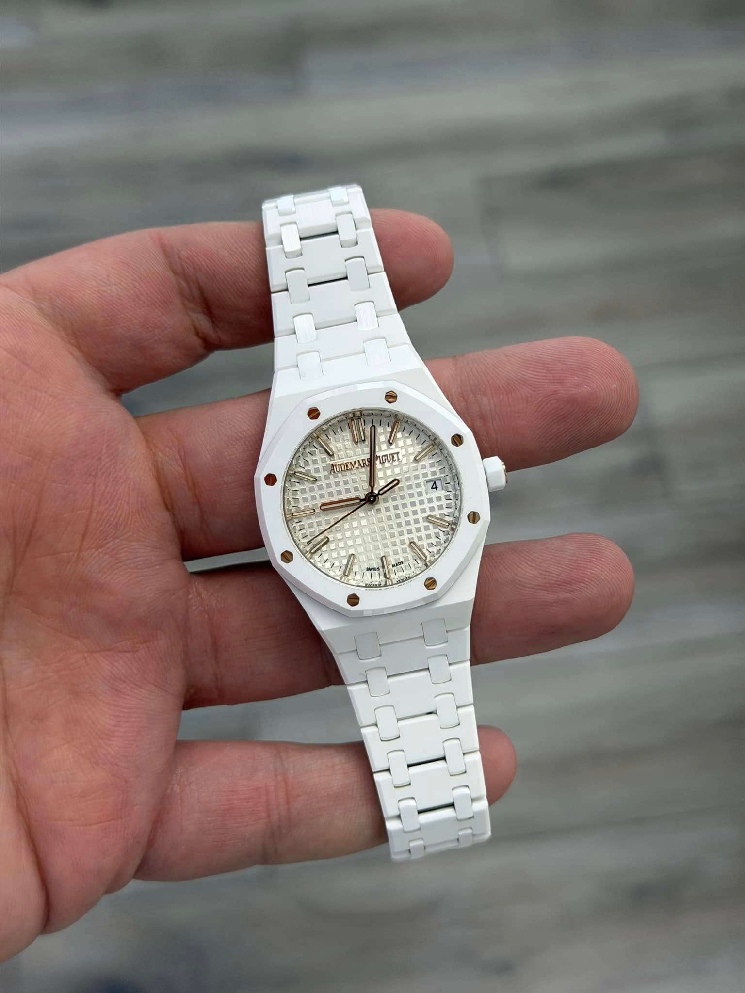 May be an image of wrist watch and text