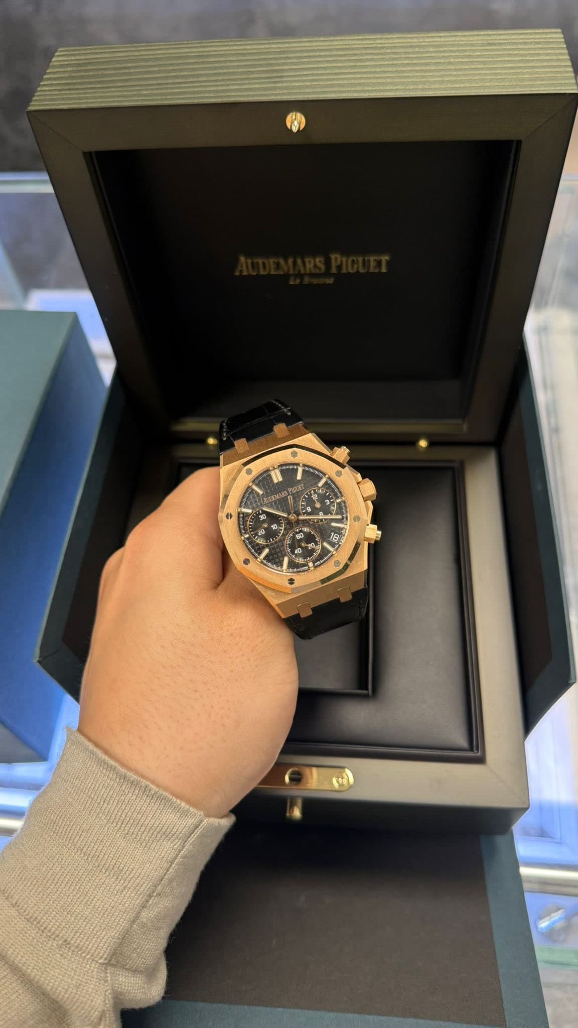 May be an image of wrist watch and text