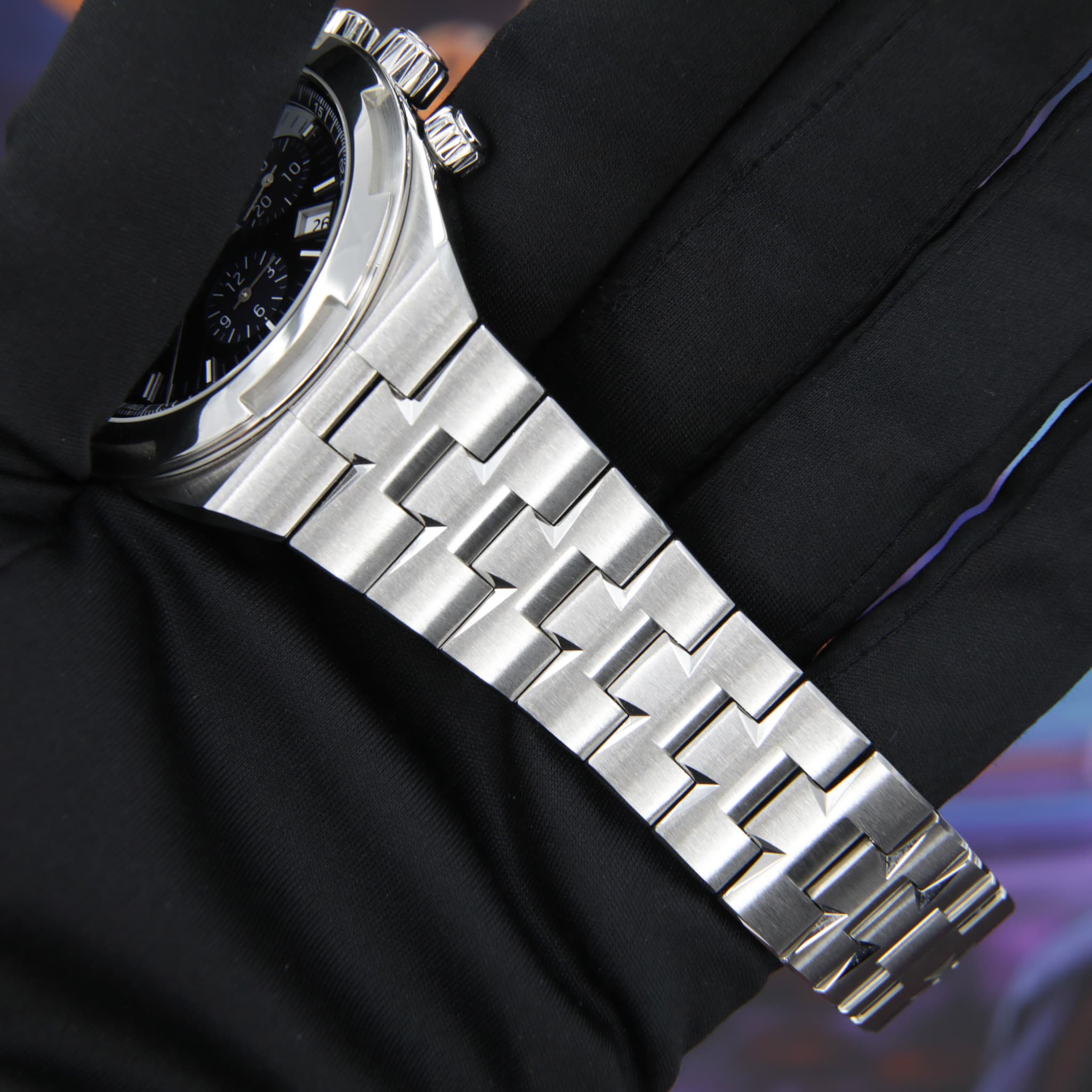 May be an image of wrist watch and text