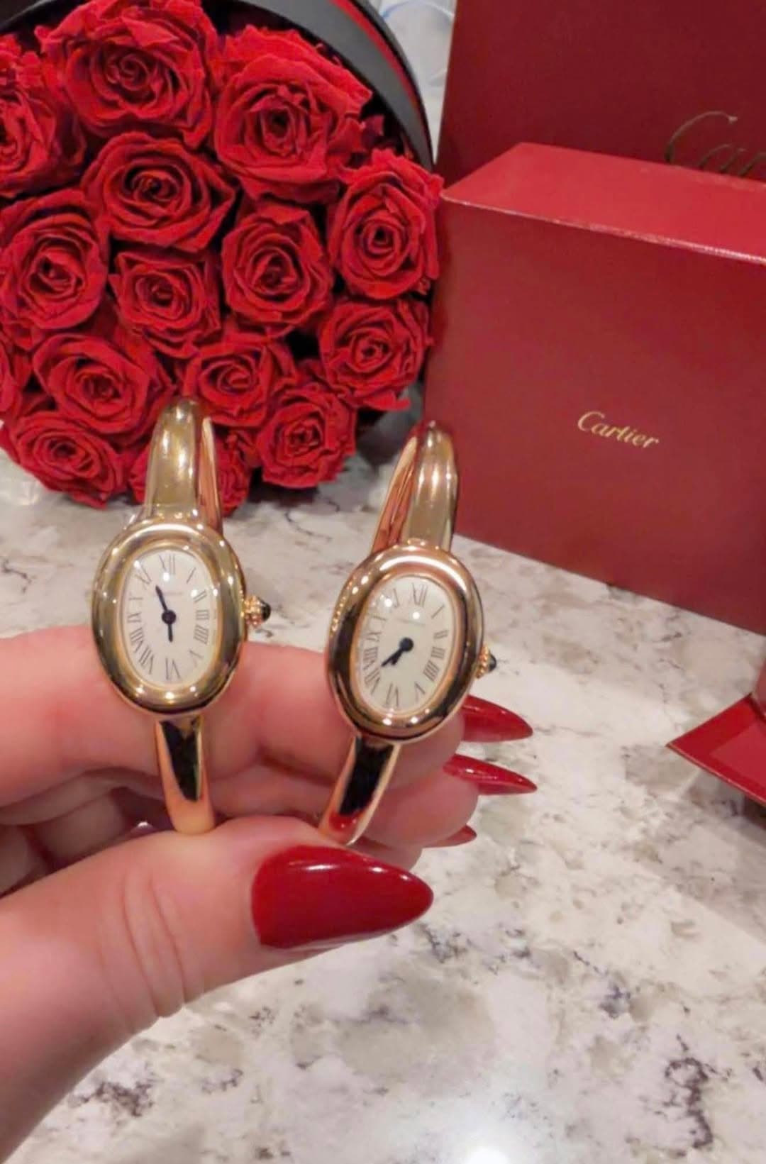 May be an image of wrist watch and text