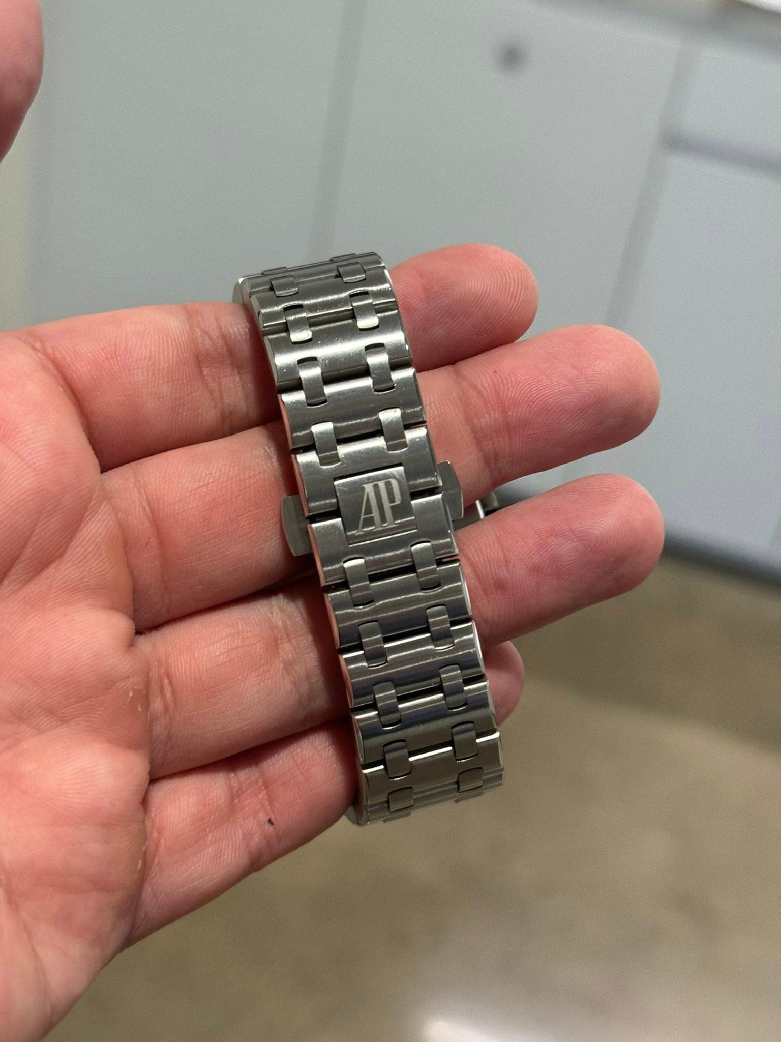 May be an image of wrist watch