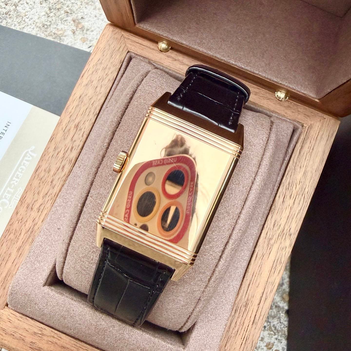 May be an image of wrist watch and text