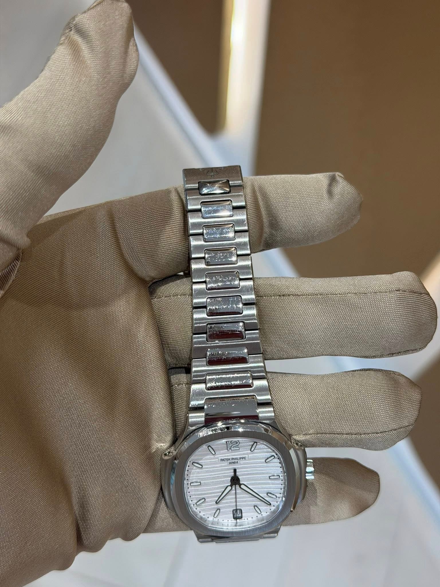 May be an image of wrist watch and text