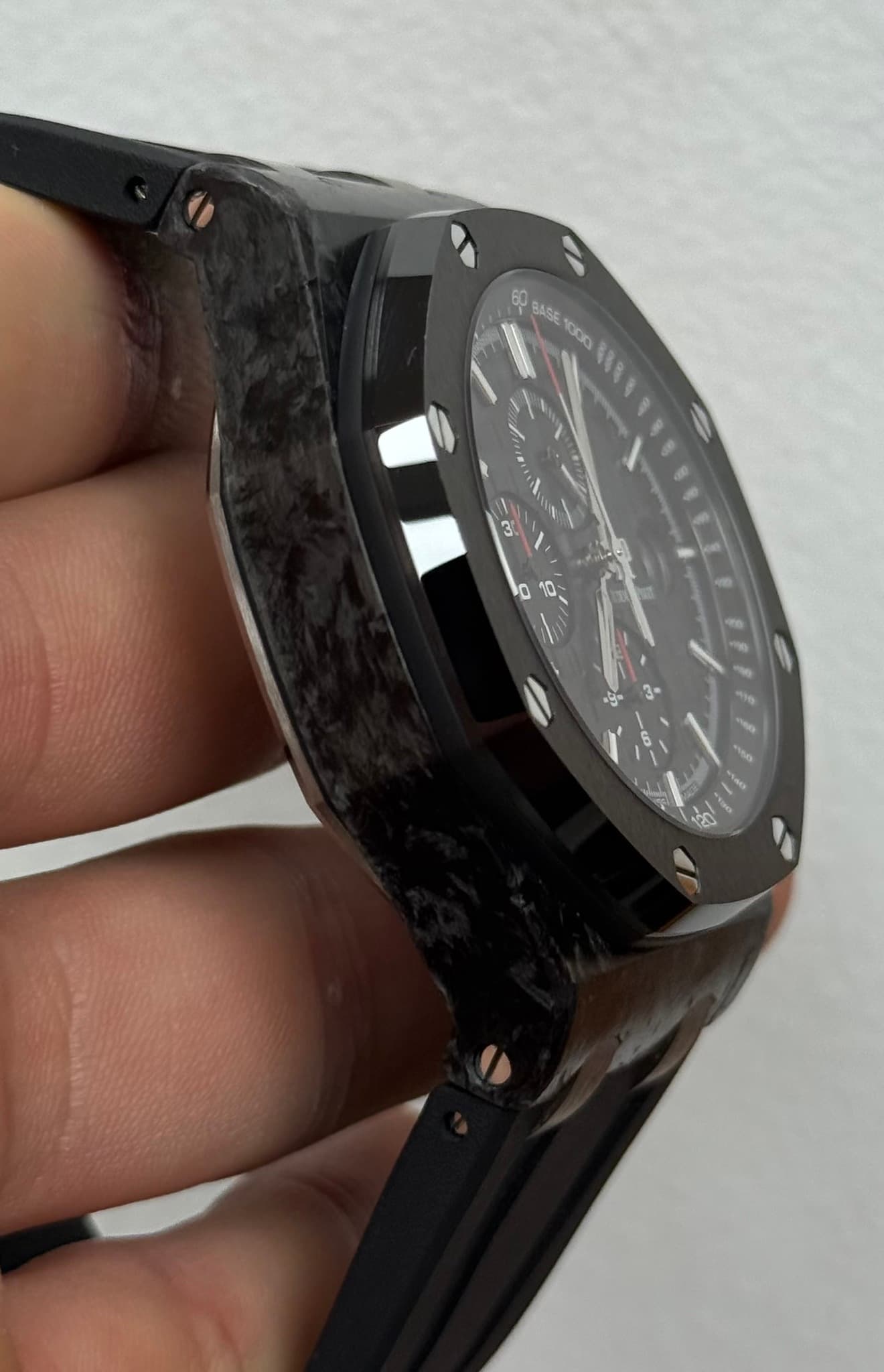 May be an image of wrist watch and text