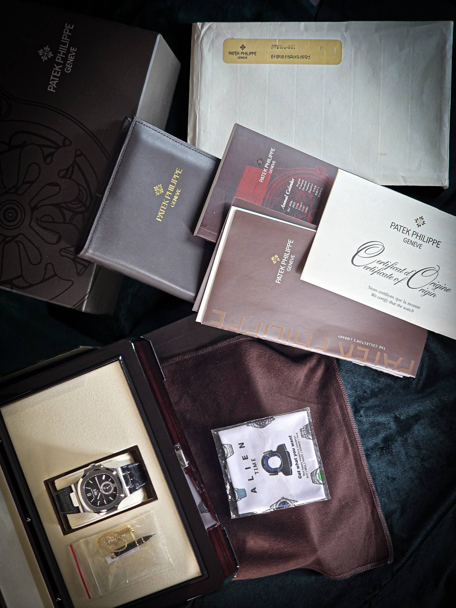 May be an image of book, matchbook, leather wallet and text