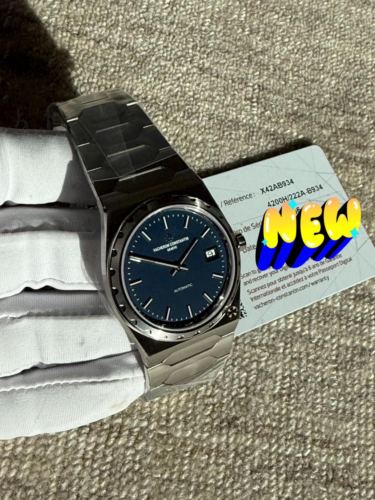 May be an image of wrist watch and text