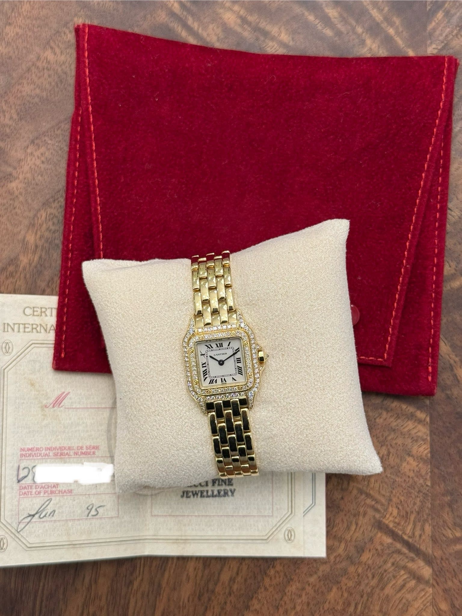 May be an image of wrist watch and text