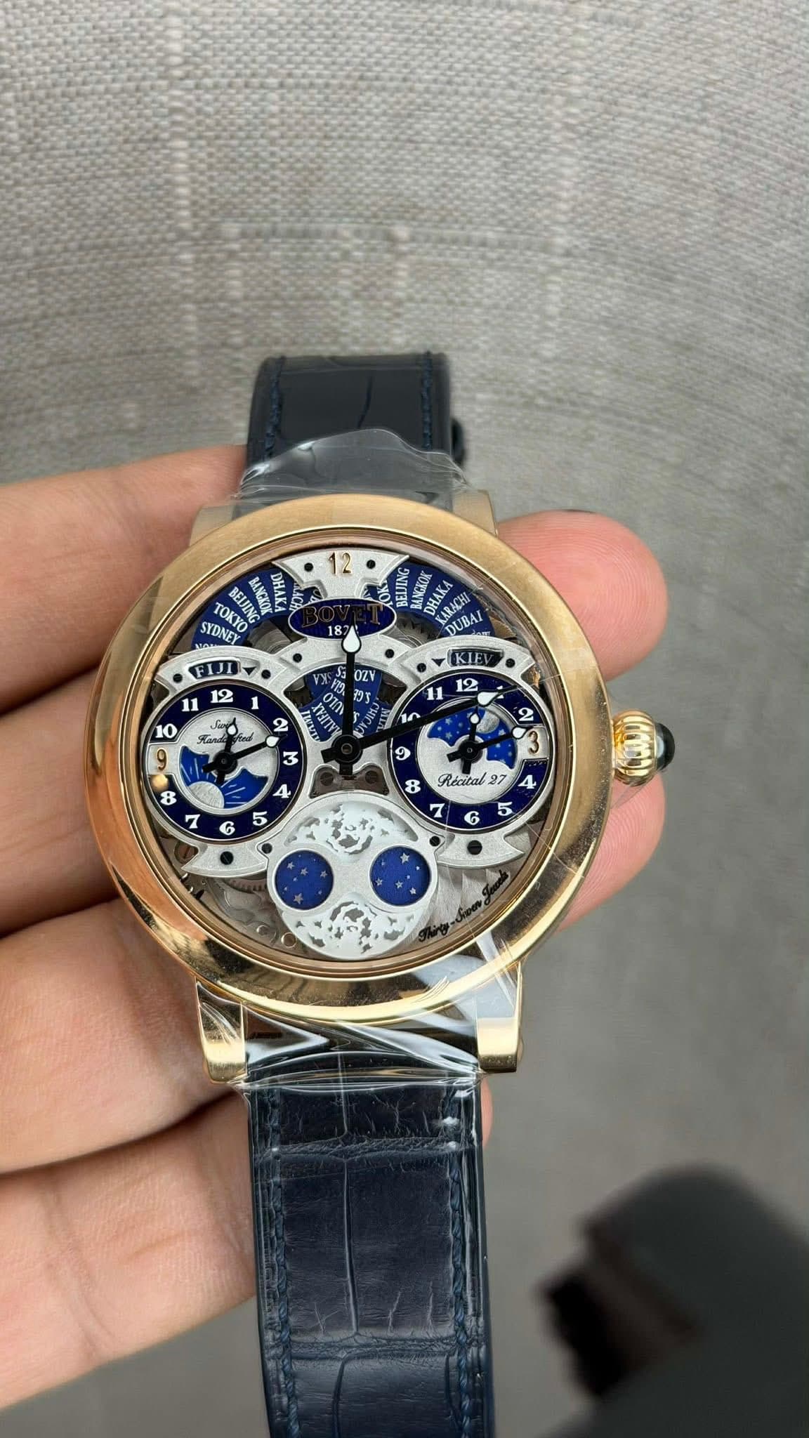 May be an image of wrist watch and text