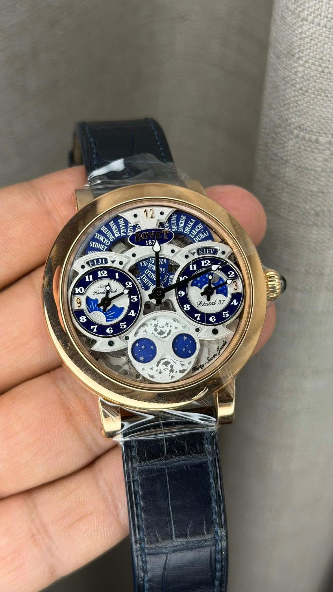 May be an image of wrist watch and text