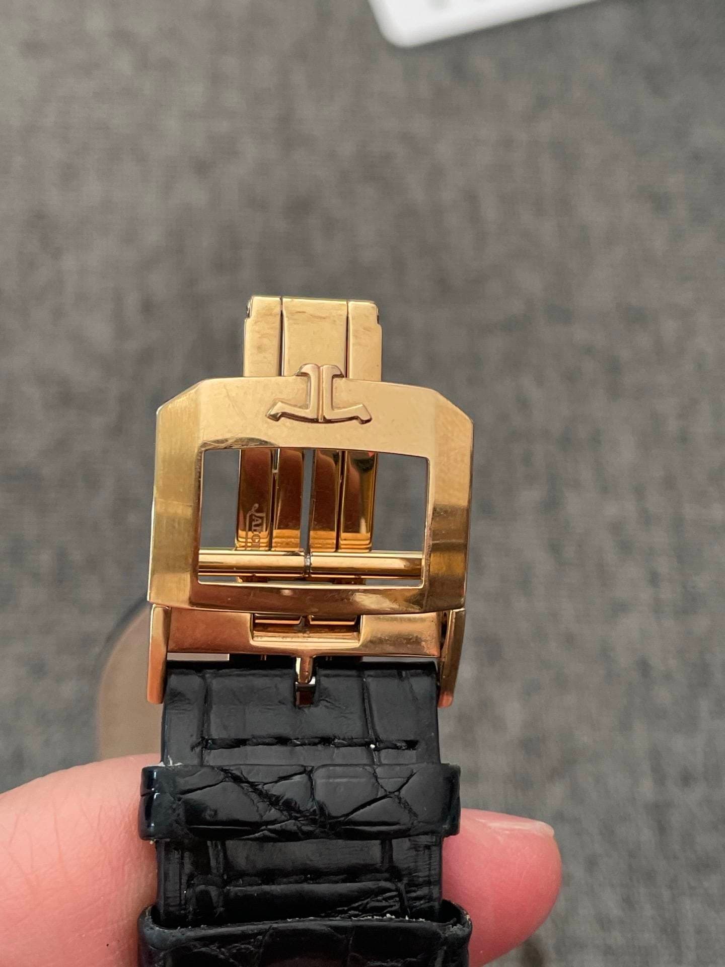 May be an image of digital watch and text