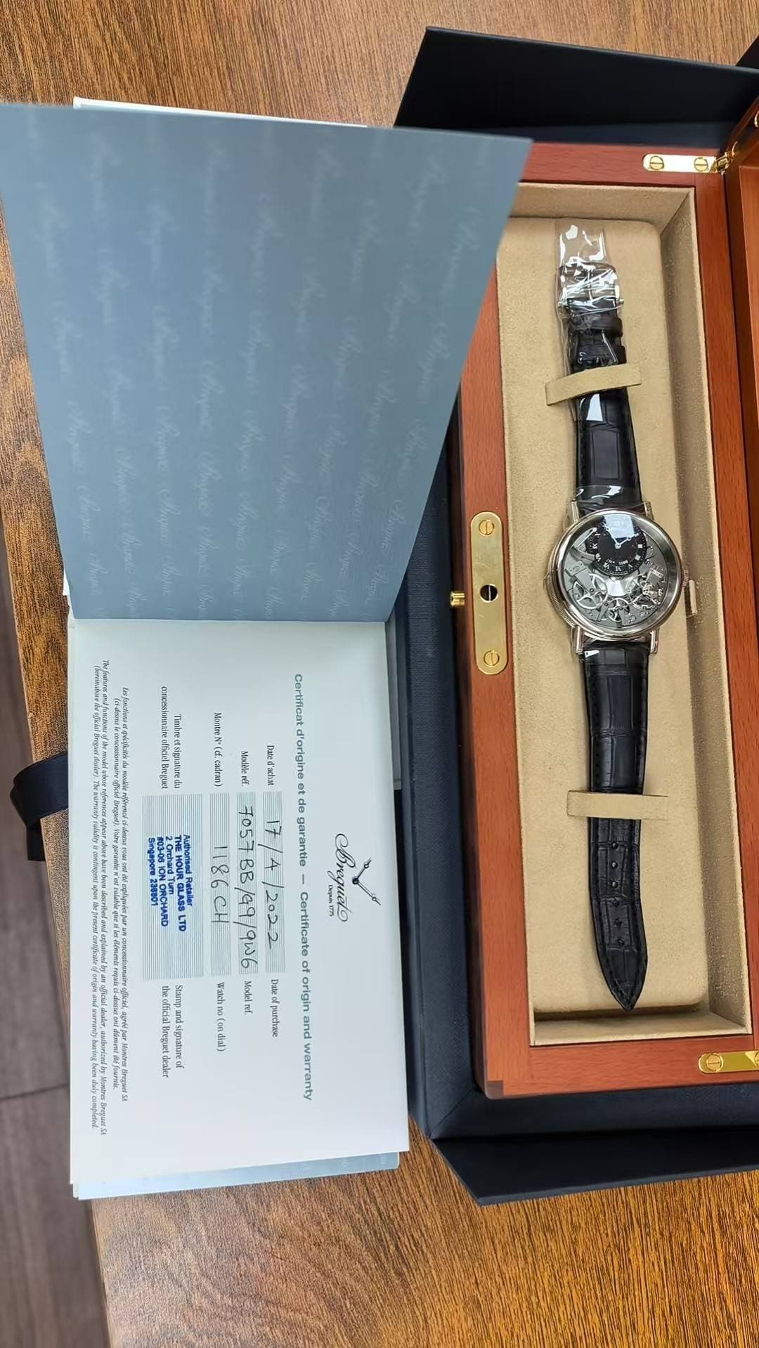 May be an image of wrist watch and text